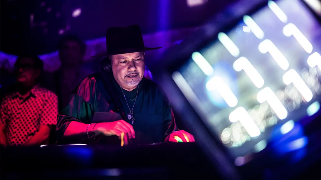 Photo of Louie Vega DJing in a nightclub