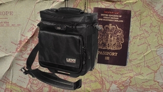 Photo of a record bag and a UK passport on a map graphic