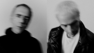 Underworld pose in a blurry black-and-white press image