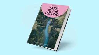 A copy of Ears To The Ground on a light blue background