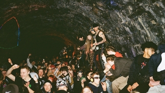 Photo of a ravers at a free party in a tunnel
